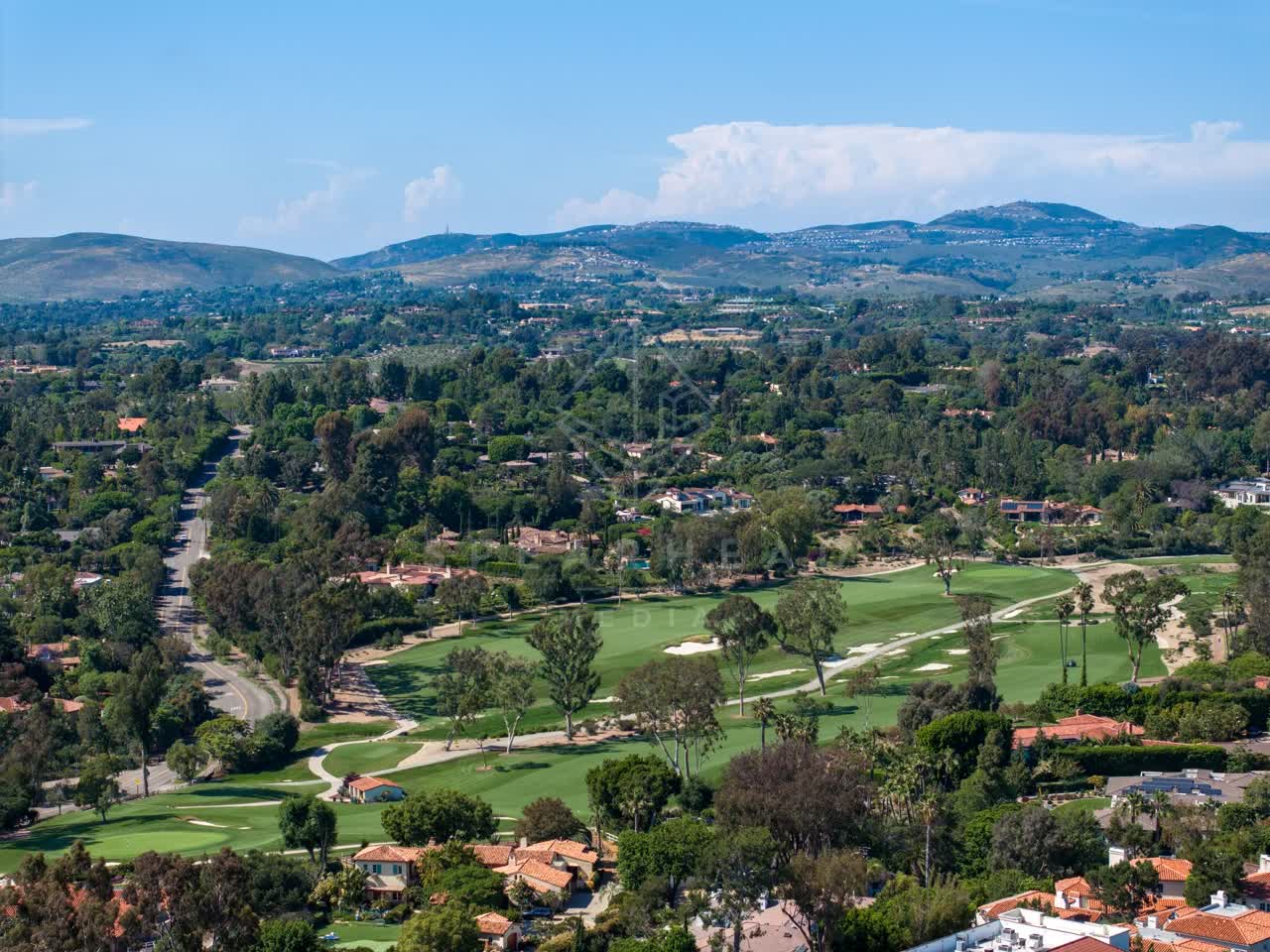 Aerial view of the country inland, homes and open country at Covenant.