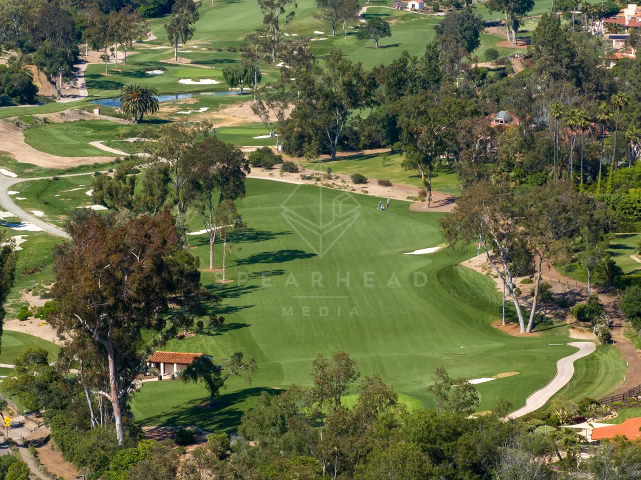 Aerial view of the country inland, palm trees and homes at Covenant.