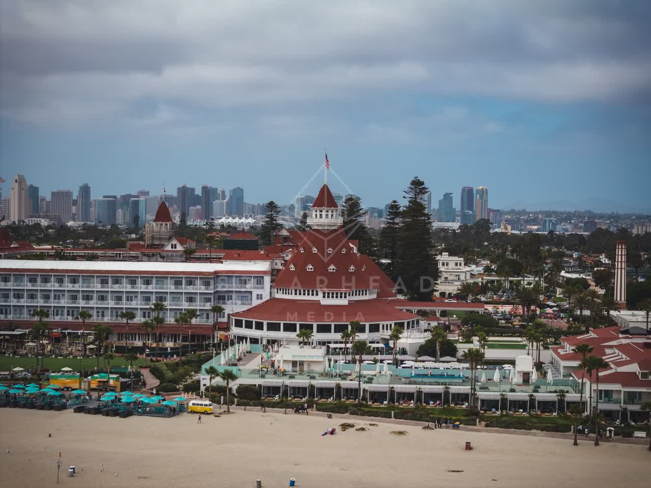 Aerial view of the beach, the skyline and palm trees at Coronado Beach.