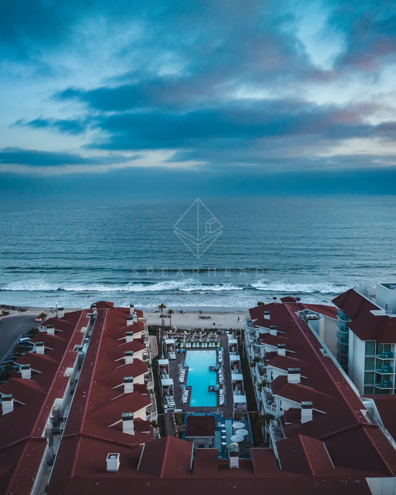 Aerial view of the beach, the surf and the ocean at Coronado Beach.