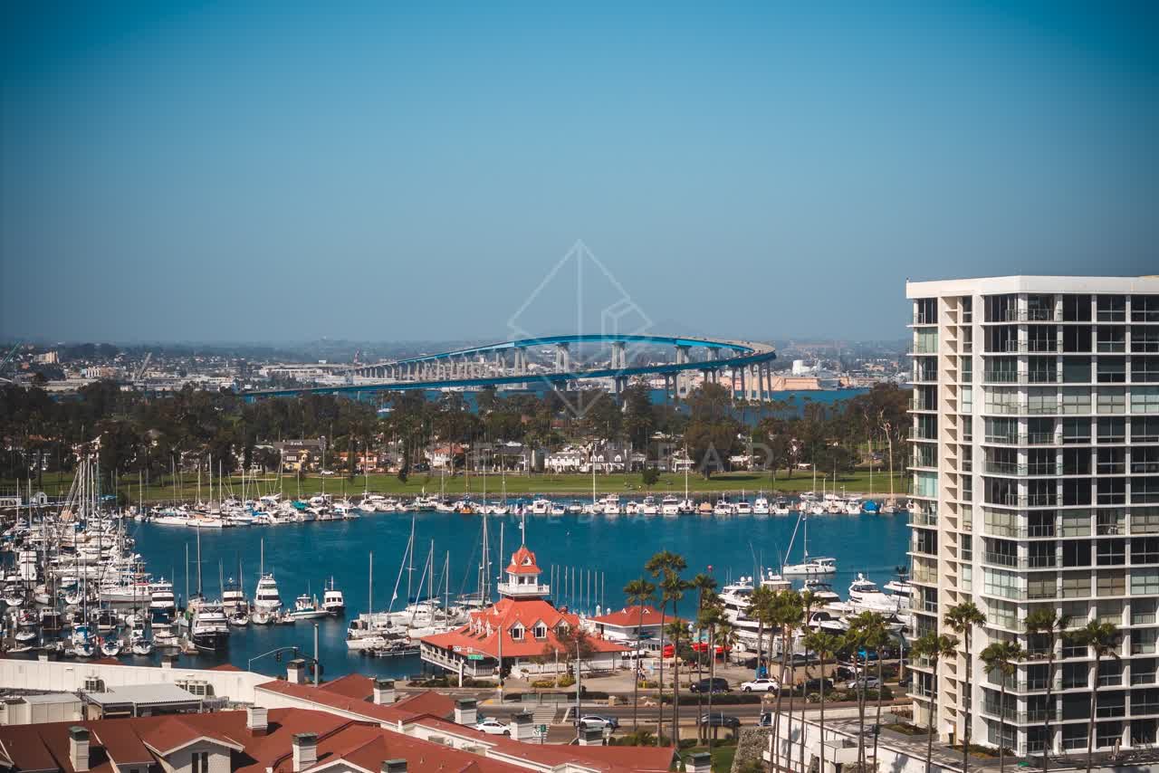 Elevated view of the harbor, the bridge and boats at Coronado Beach.