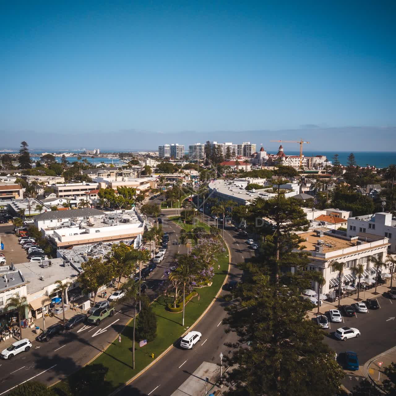 Aerial view of the downtown streets, the skyline and palm trees in Coronado.
