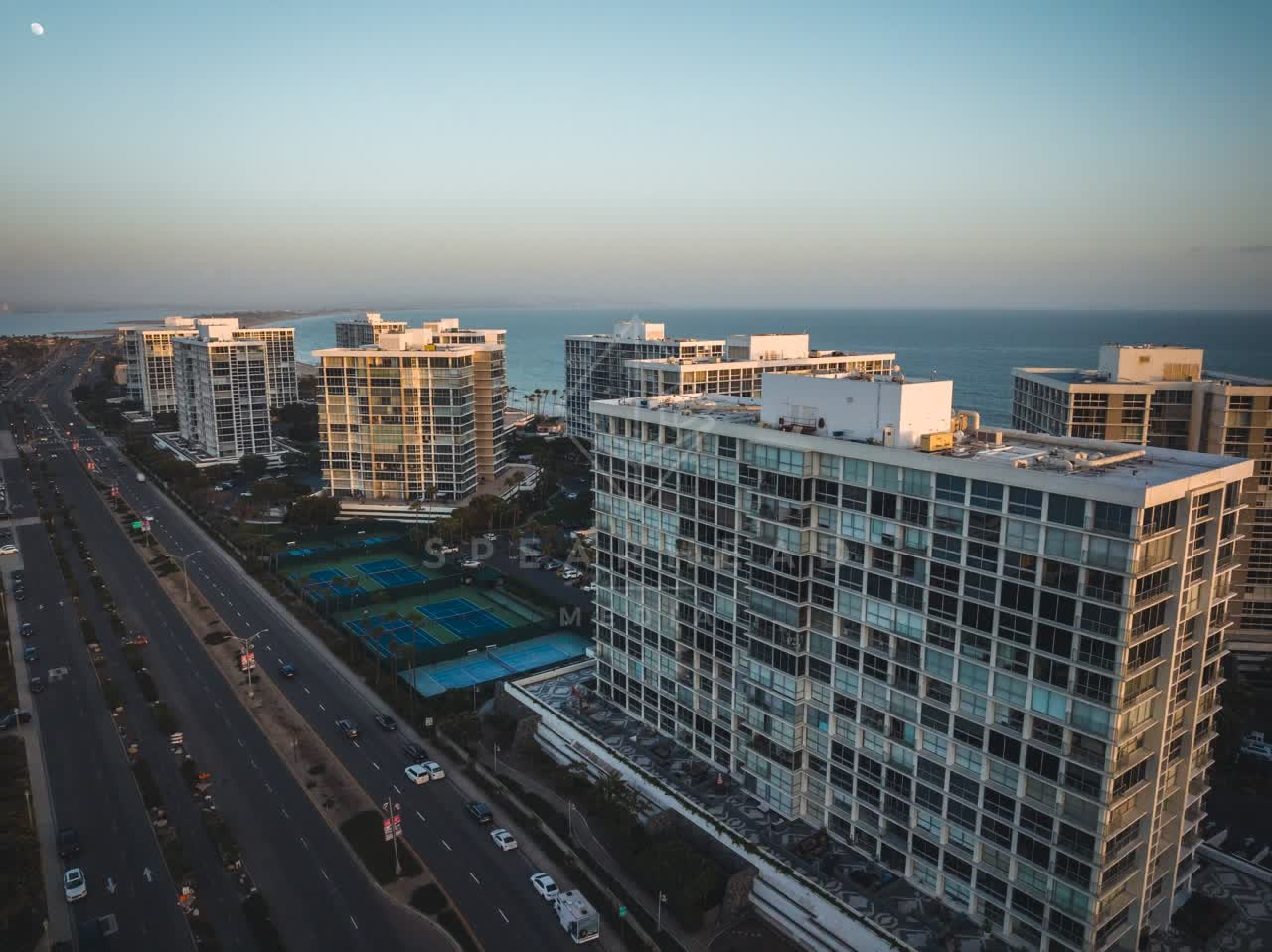 Aerial view of a residential street, the ocean and homes at Coronado Beach.