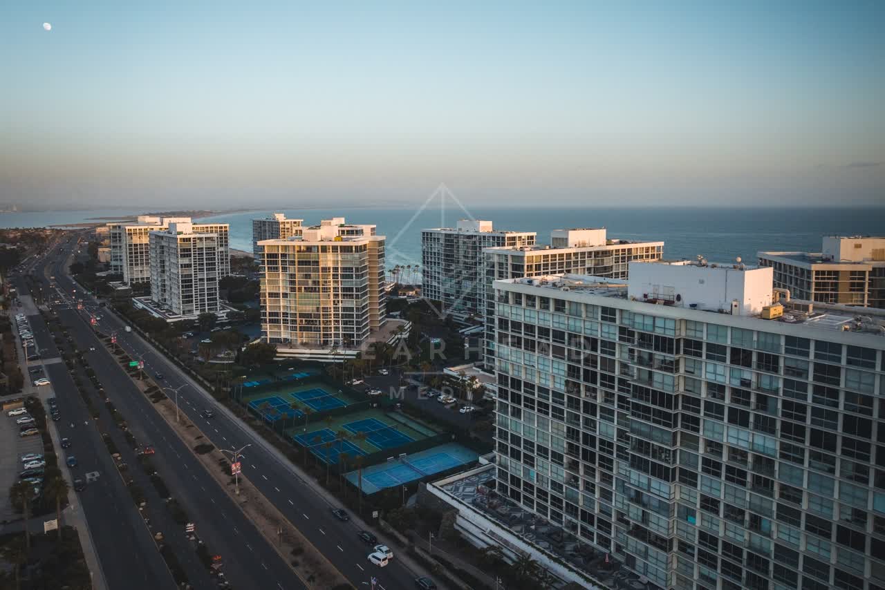 Aerial view of a residential street, the ocean and homes at Coronado Beach.