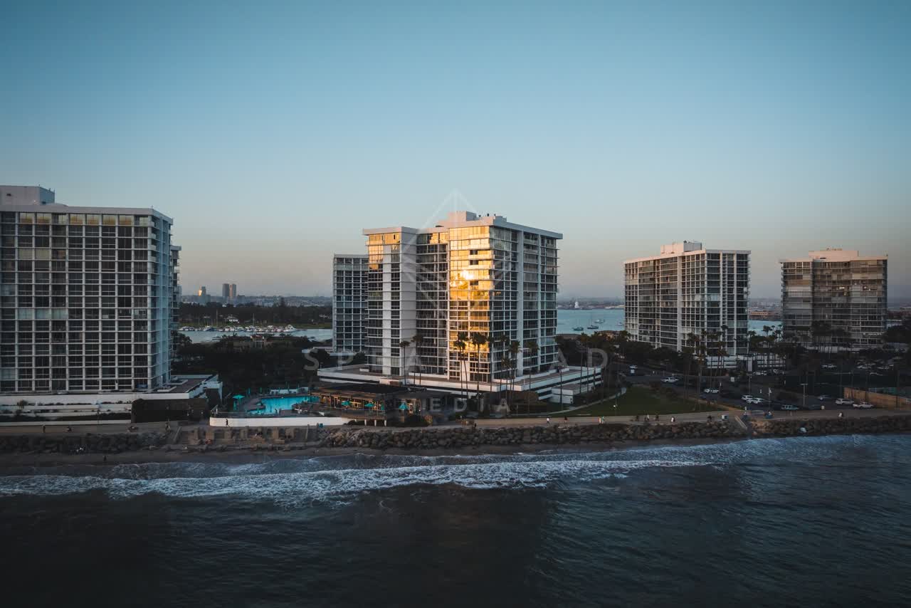 Aerial view of the beach, the ocean and homes at Coronado Beach.