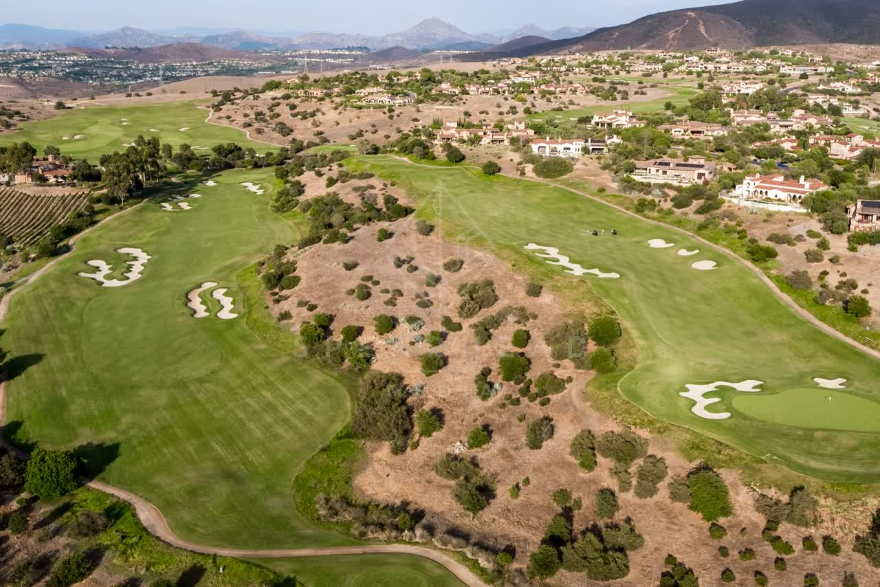 Aerial view of the country inland, homes and the buildings in Santaluz.
