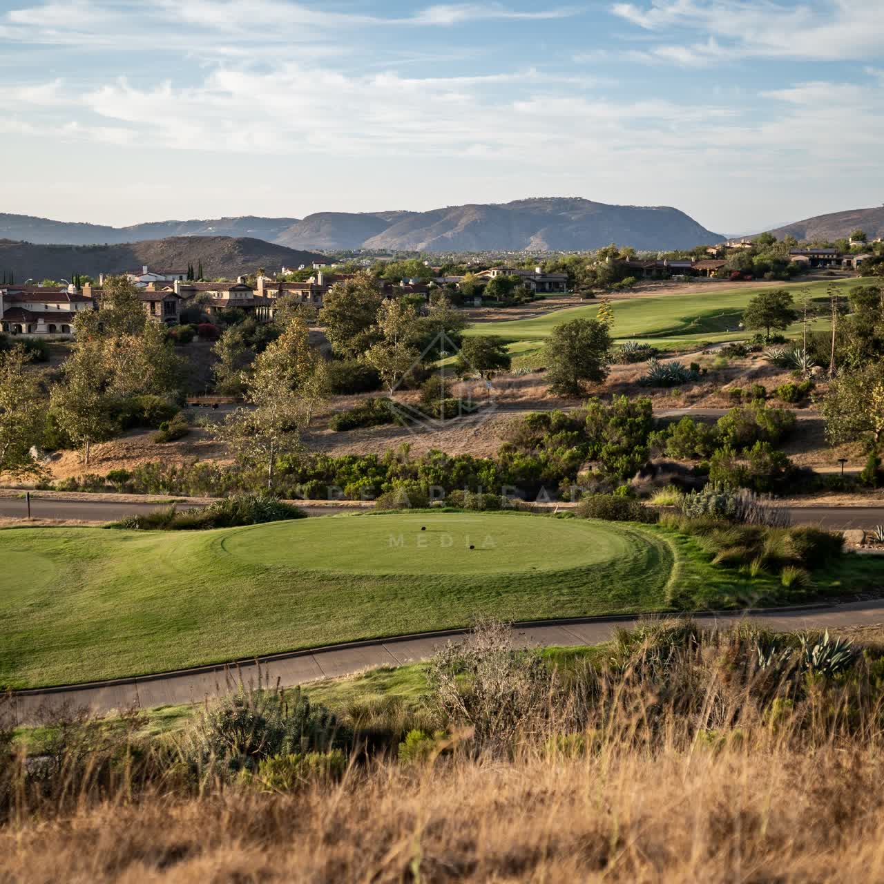 Elevated view of the country inland, homes and the buildings in Santaluz.