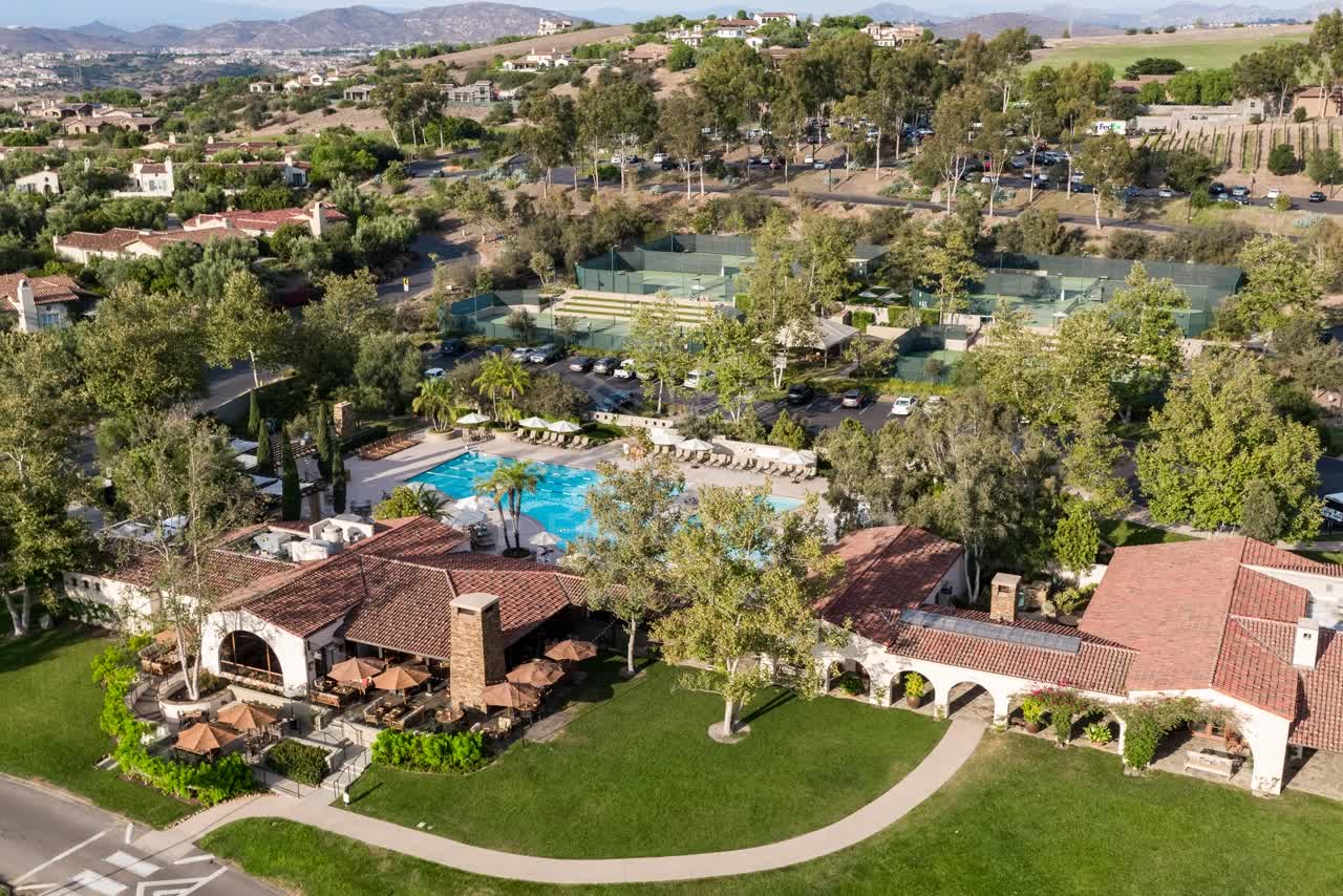 Aerial view of the country inland, palm trees and the buildings in Santaluz.