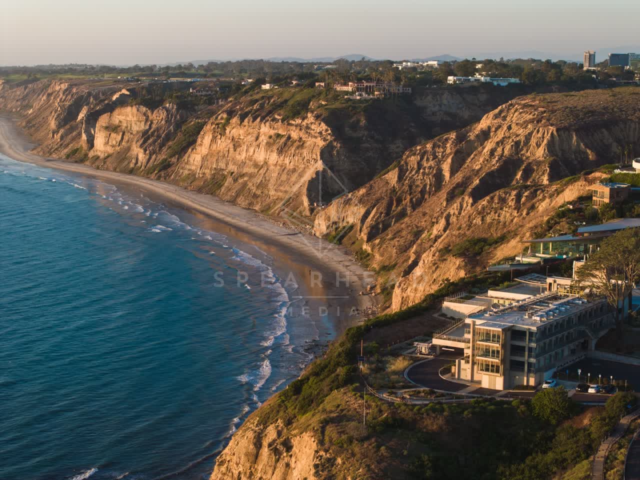 Aerial view of the cliffs, the ocean and homes at Black’s Beach.