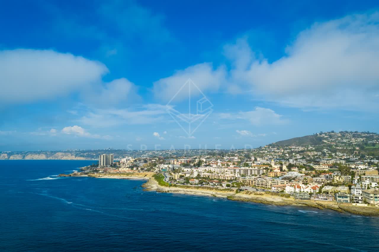 Aerial view of the cliffs, the ocean and homes at La Jolla Cove.