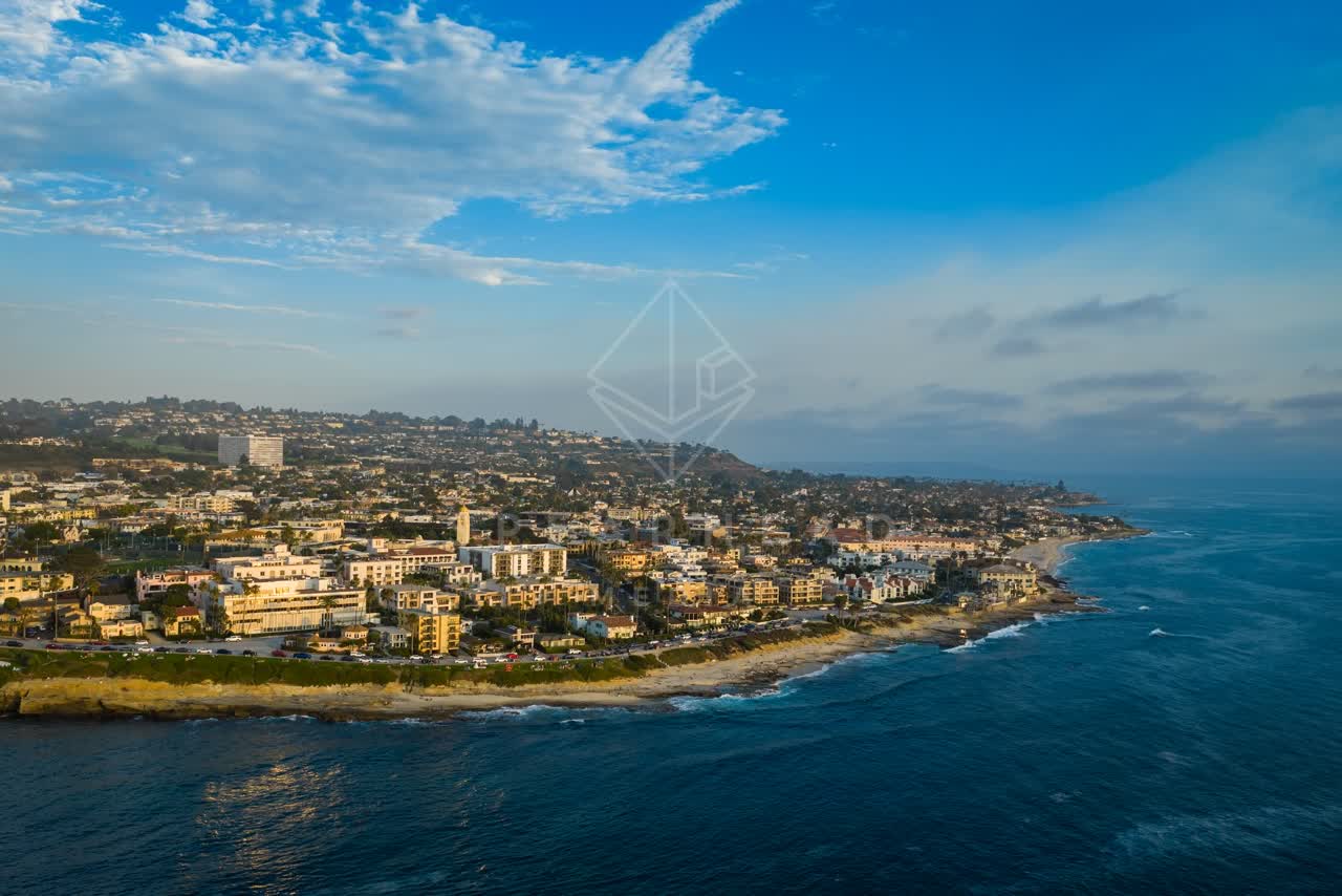 Aerial view of the cliffs, the ocean and homes at La Jolla Cove.