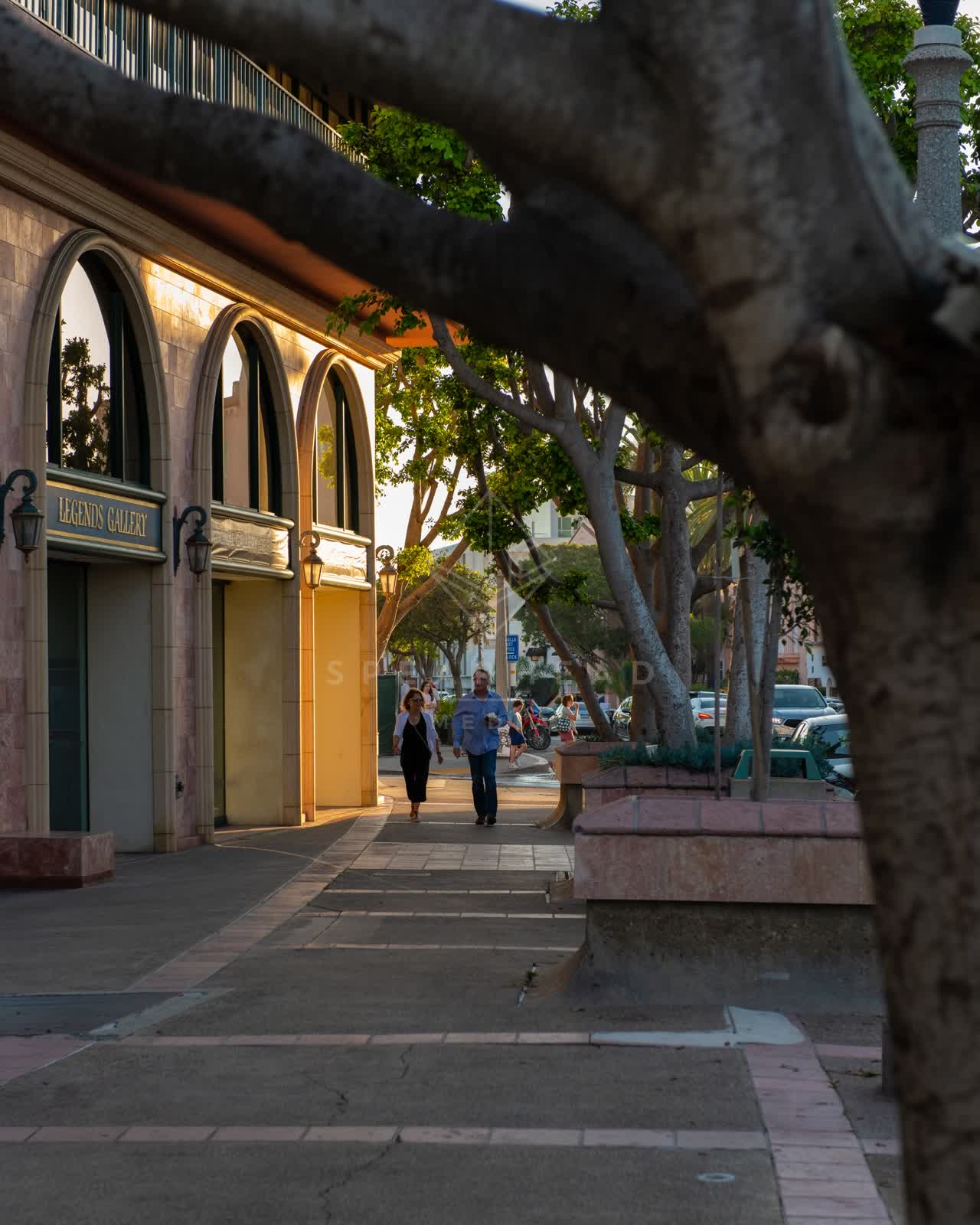 The downtown streets, the buildings and the city at Village of La Jolla, with people walking.