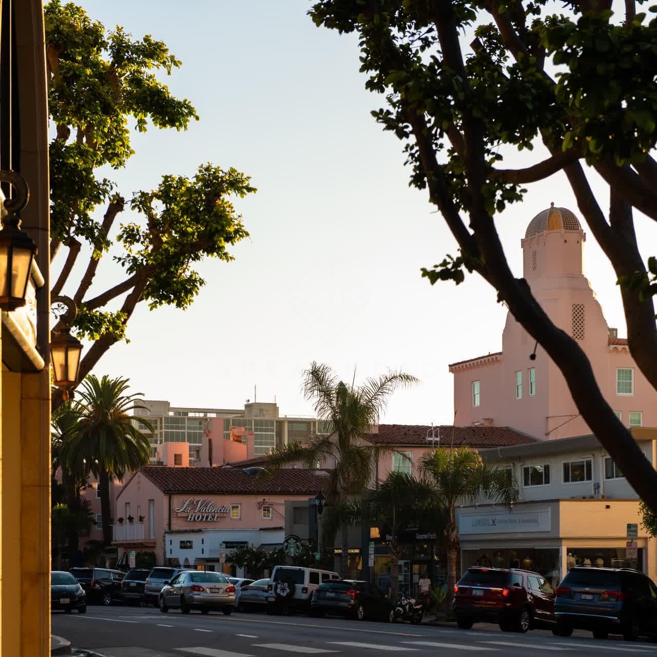 The downtown streets, palm trees and the buildings at Village of La Jolla.