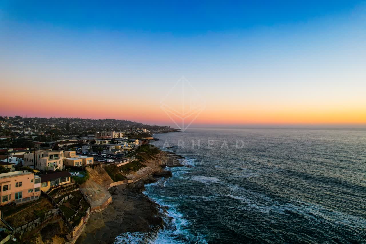 Aerial view of the cliffs, the ocean and homes in Ocean Beach.