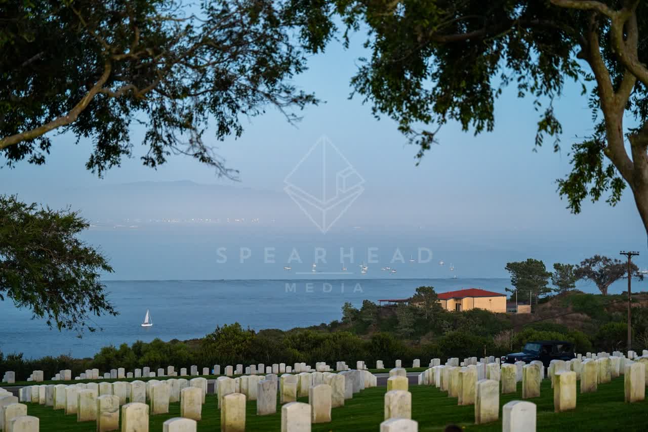 Elevated view of the cliffs, boats and the ocean at Fort Rosecrans.