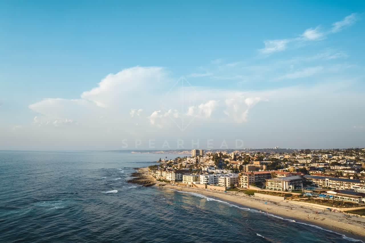 Aerial view of the beach, the surf and the ocean at Windansea.