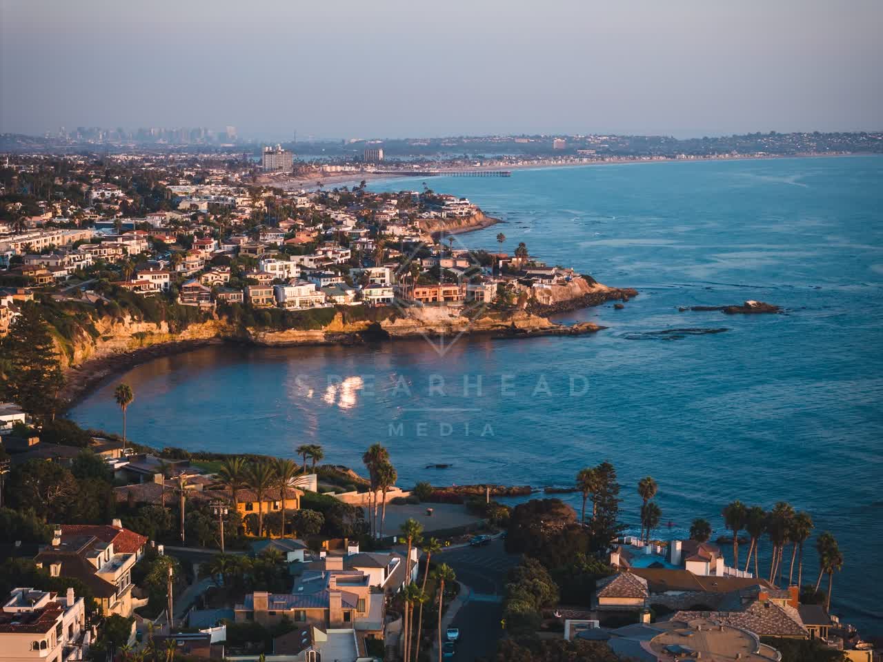Aerial view of the cliffs, the skyline and palm trees at Bird Rock.