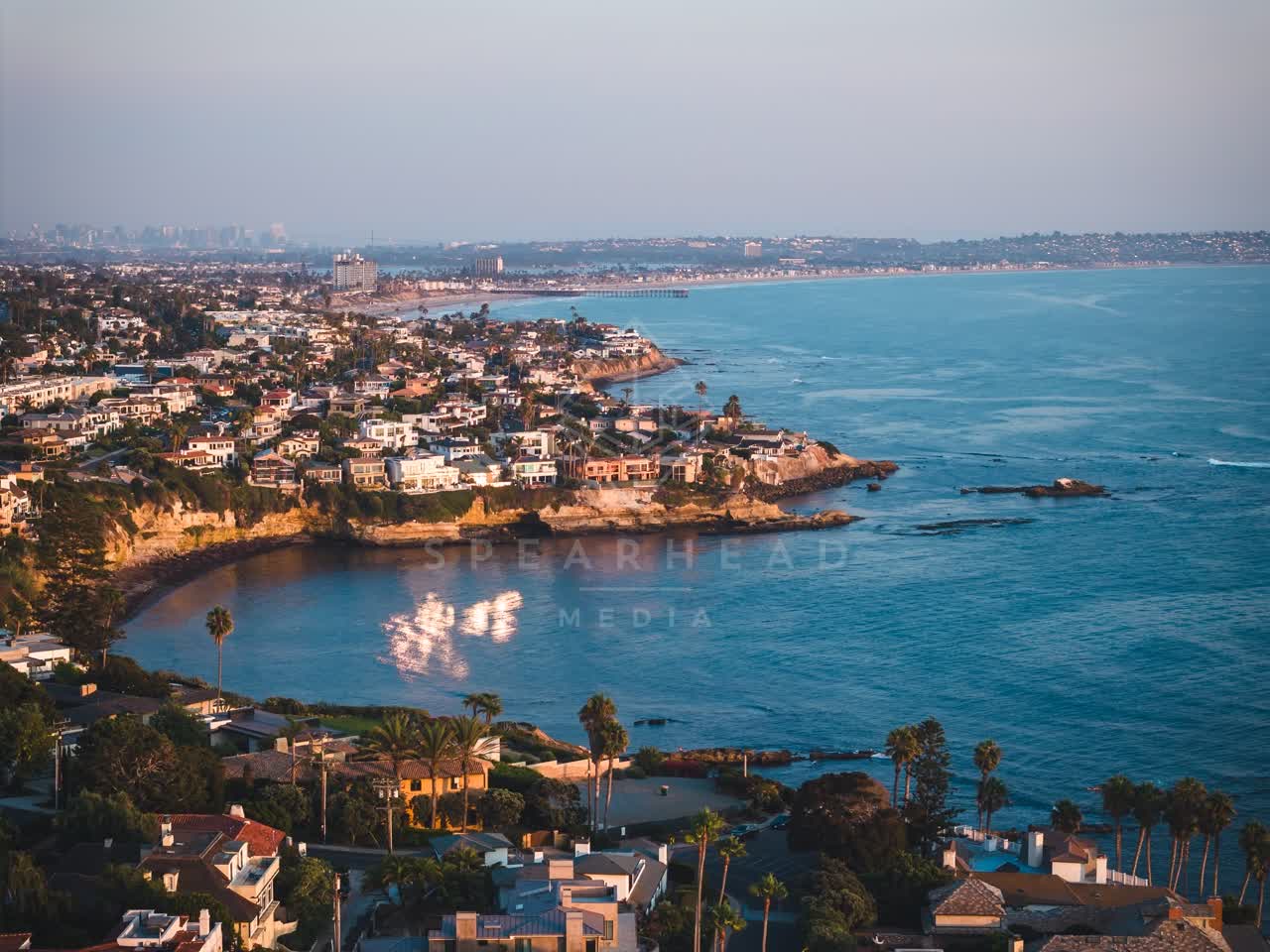 Aerial view of the cliffs, the skyline and palm trees at Bird Rock.