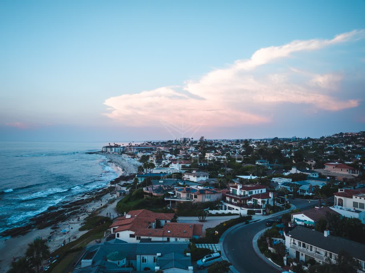 Aerial view of a residential street, the ocean and homes at Windansea.