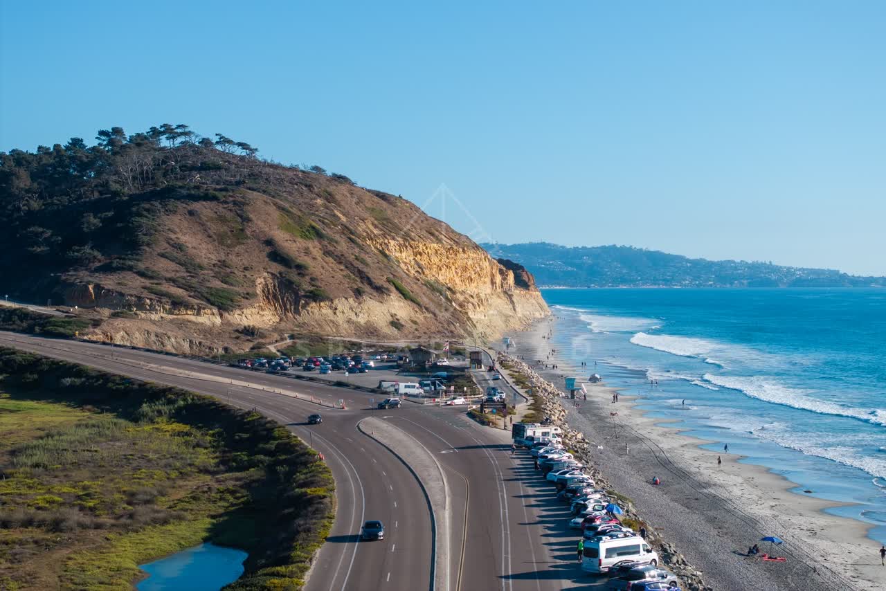 Aerial view of the cliffs, the surf and the ocean at Torrey Pines.