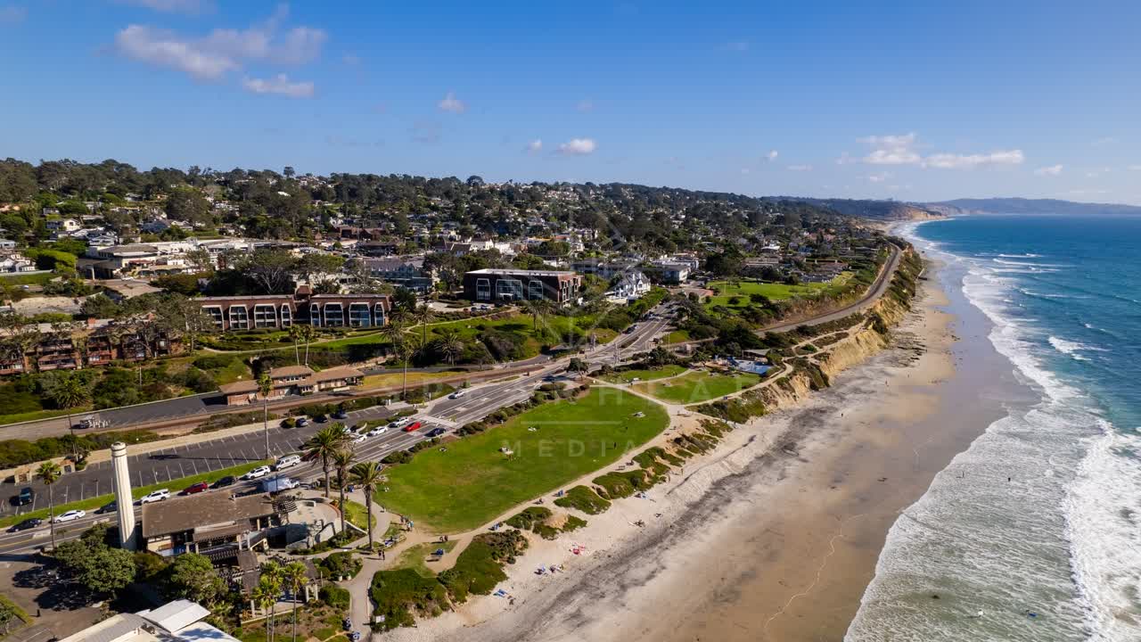 Aerial view of the beach, the surf and the ocean at Powerhouse Park.