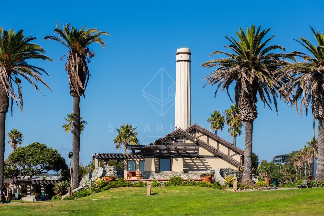 A park, palm trees and the buildings at Powerhouse Park.