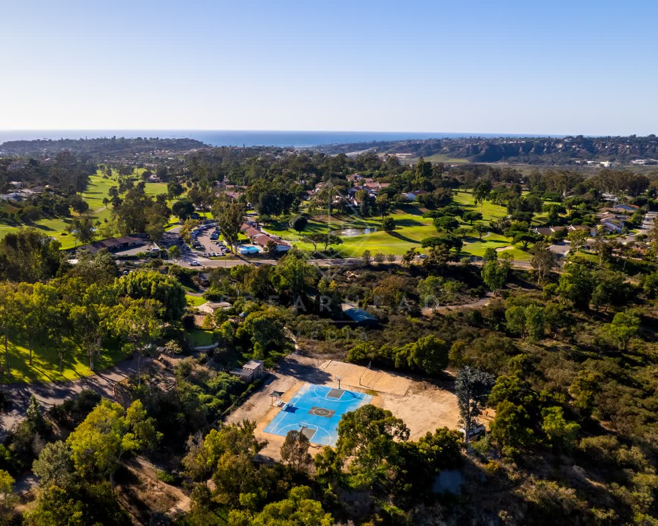 Aerial view of a park, the ocean and homes in Solana Beach.