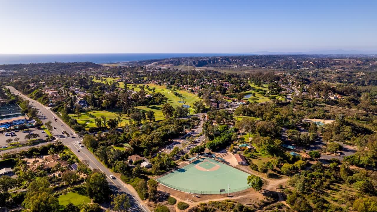 Aerial view of a residential street, the ocean and homes in Solana Beach.