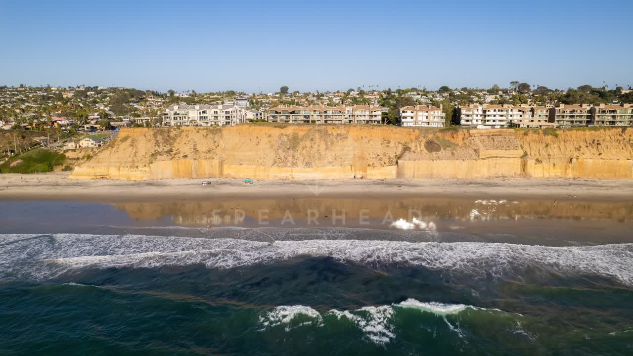 Aerial view of the beach, the surf and the ocean at Fletcher Cove.