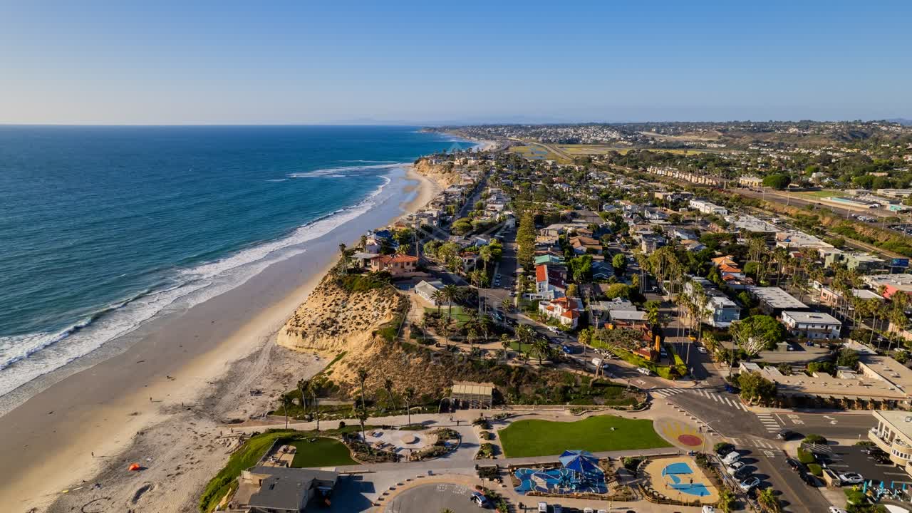 Aerial view of the beach, palm trees and the ocean at Fletcher Cove.
