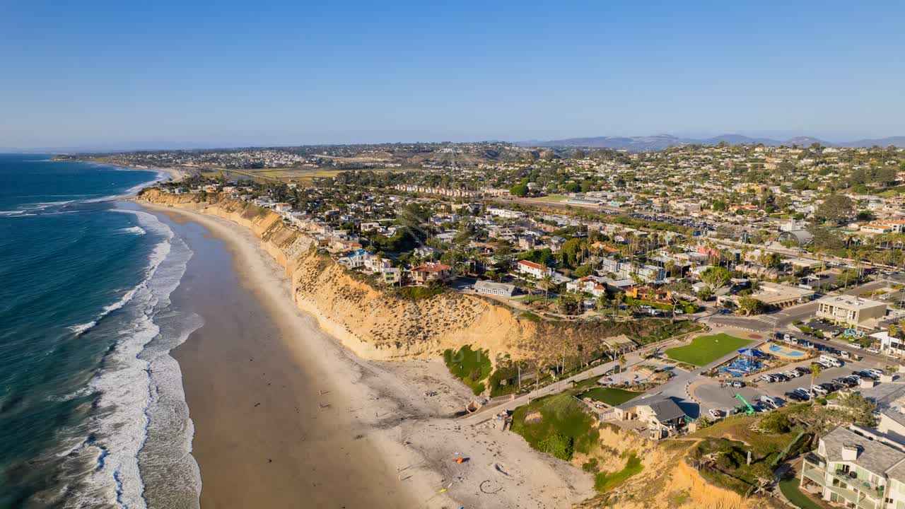 Aerial view of the cliffs, the surf and the ocean at Fletcher Cove.
