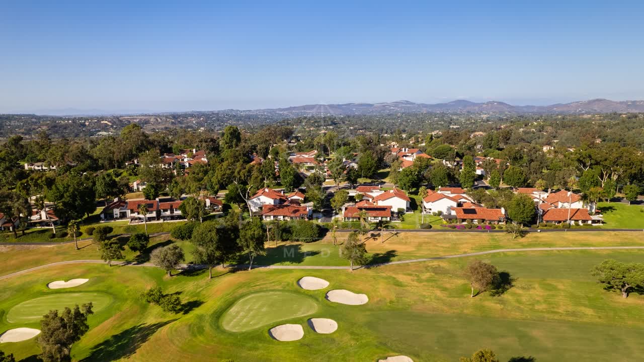 Aerial view of a residential street, homes and the buildings in Solana Beach.