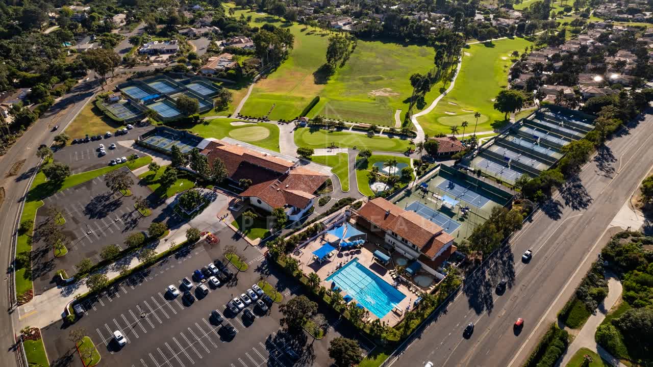 Aerial view of a residential street, palm trees and homes in Solana Beach.