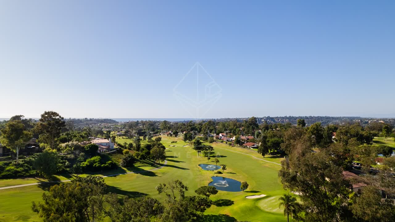 Aerial view of the country inland, palm trees and homes in Solana Beach.