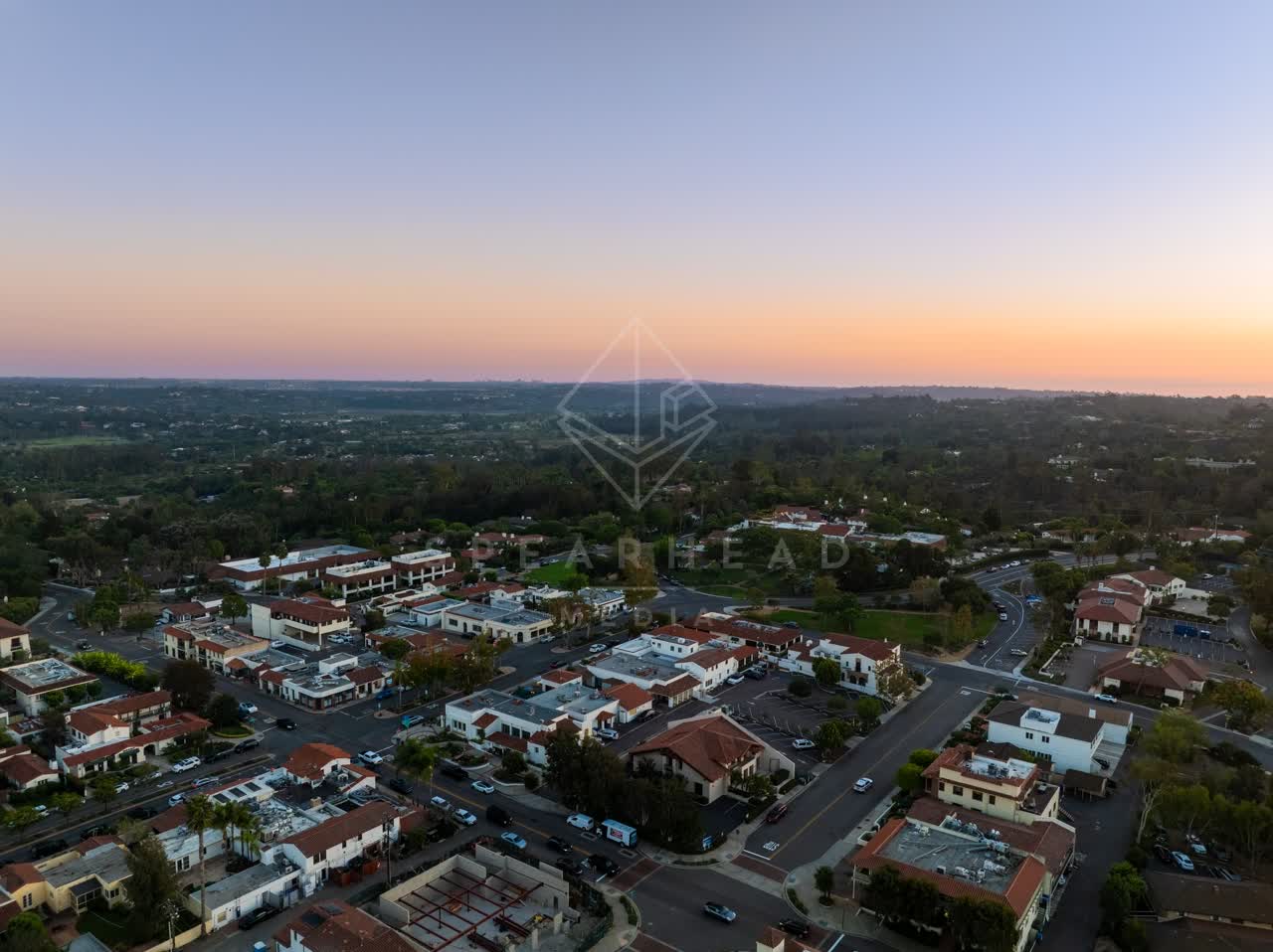 Aerial view of a residential street, homes and the buildings at Covenant.