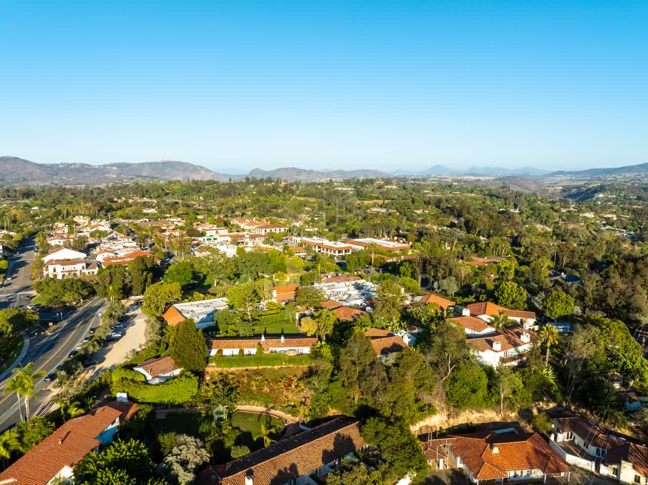 Aerial view of a residential street, homes and the buildings at Covenant.