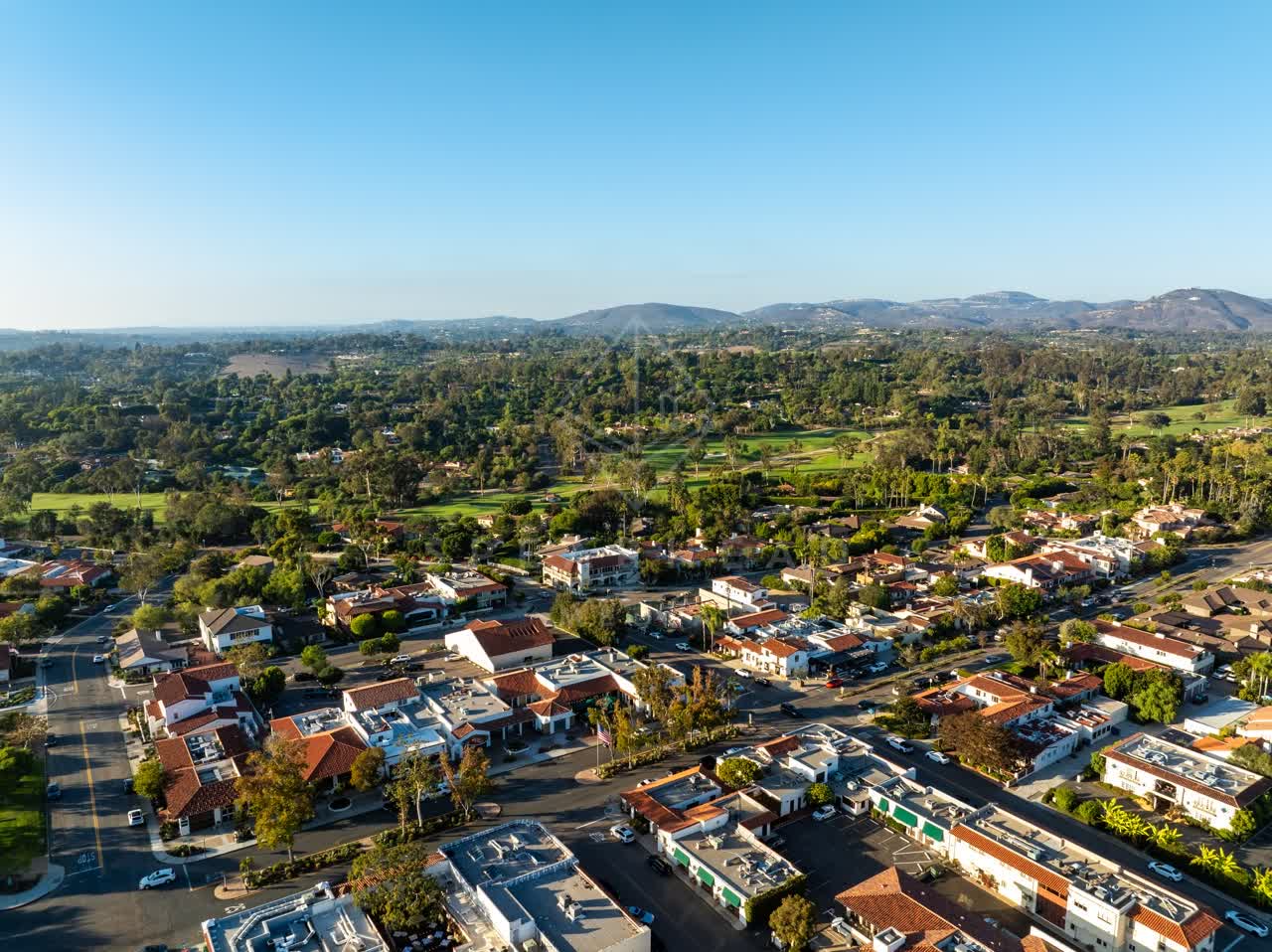 Aerial view of a residential street, homes and the buildings at Covenant.