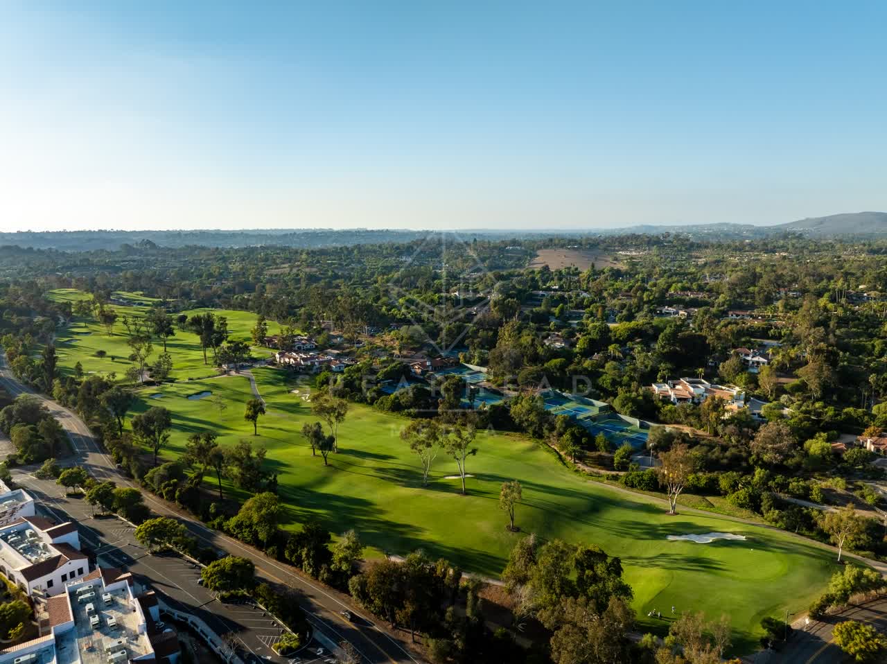 Aerial view of the country inland, homes and open country at Covenant.