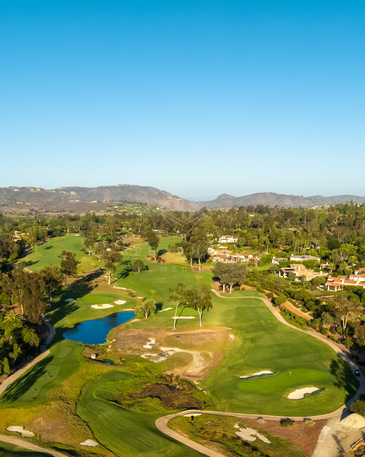 Aerial view of the country inland, homes and open country at Covenant.