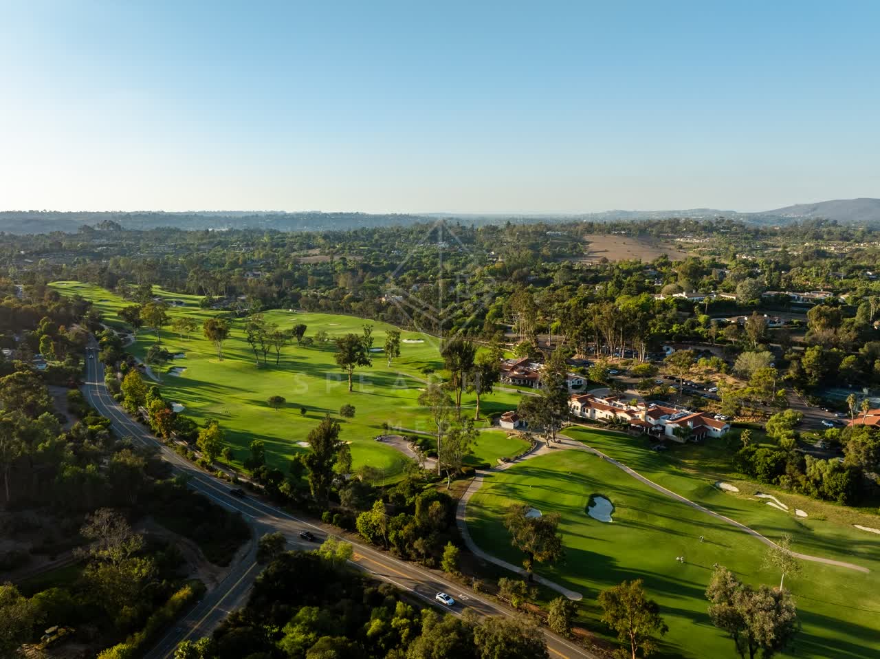 Aerial view of the country inland, homes and traffic at Covenant.
