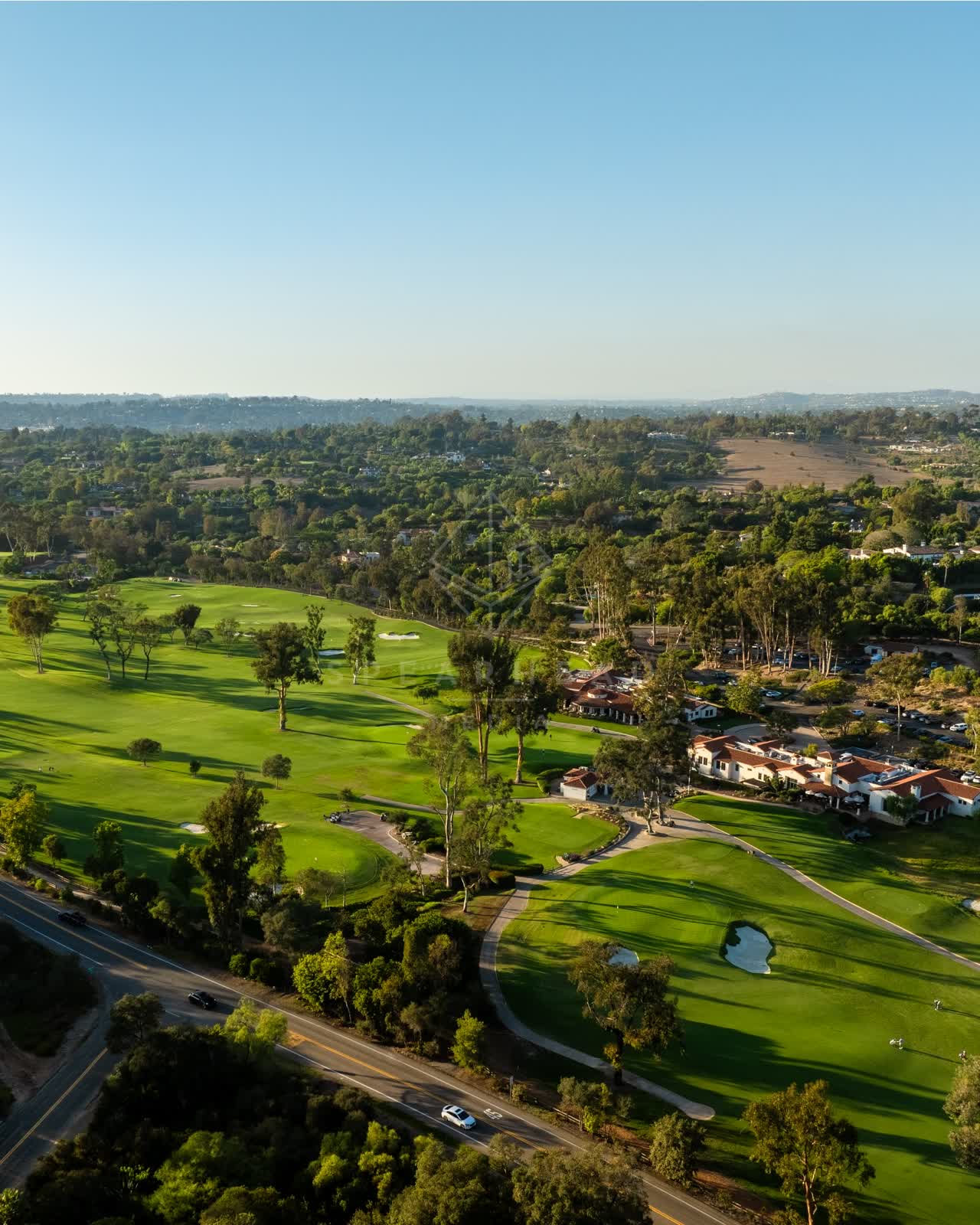 Aerial view of the country inland, homes and traffic at Covenant.