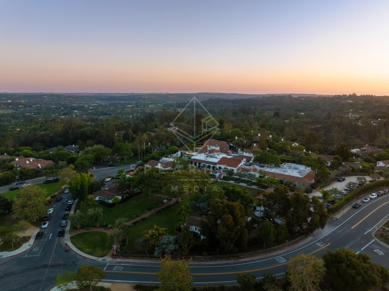 Aerial view of the country inland, palm trees and homes at Covenant.