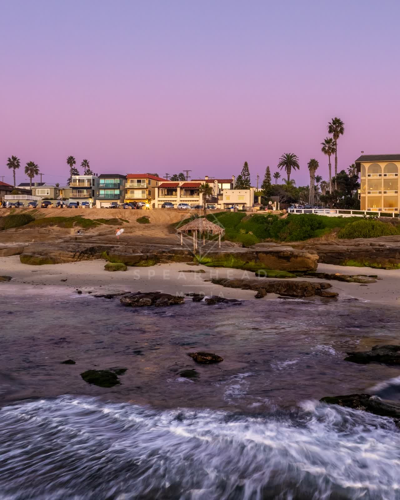 The beach, the surf and palm trees at Windansea.