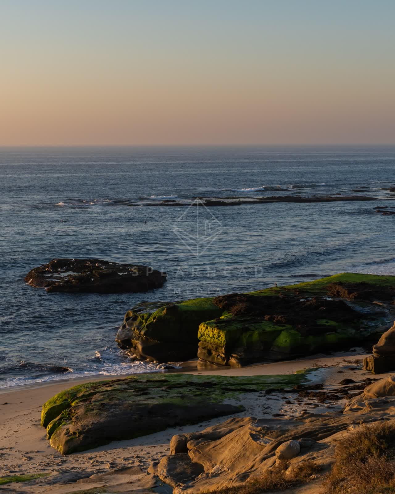 Elevated view of the cliffs, the ocean and the beach at Windansea.