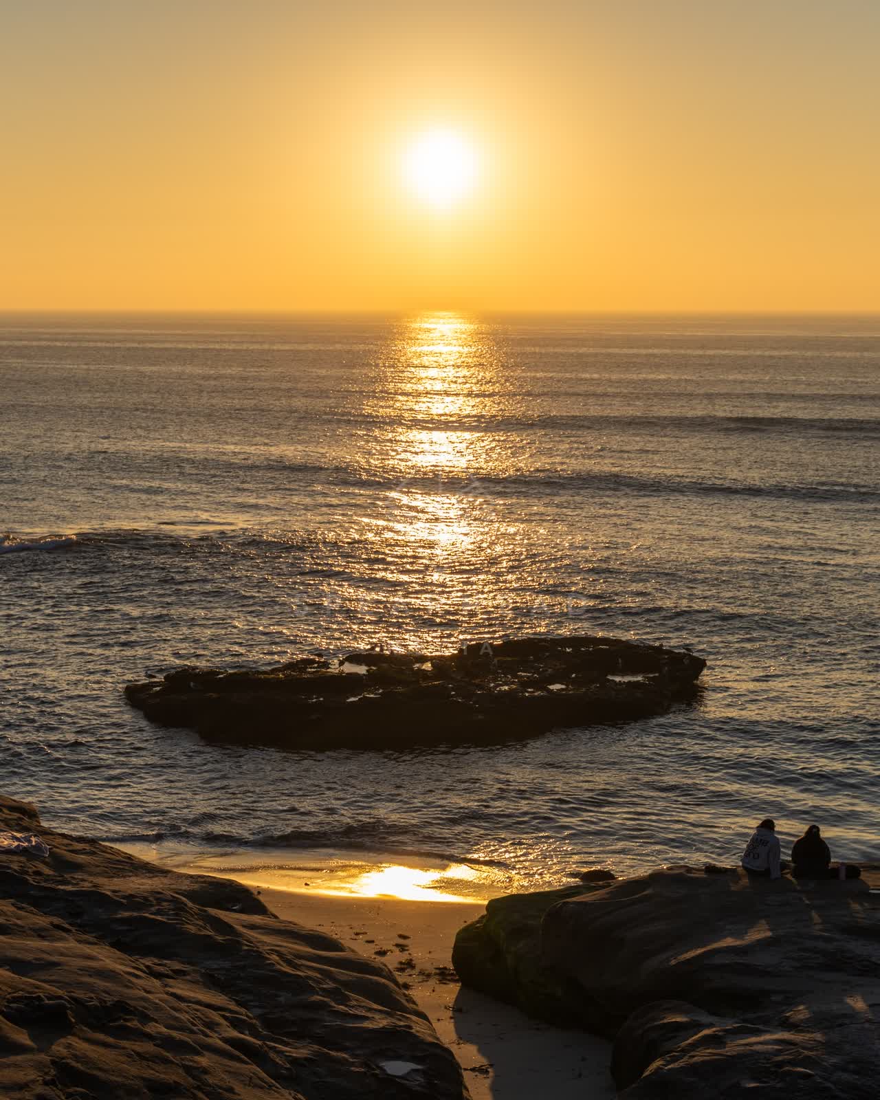 Elevated view of the cliffs, the ocean and the beach at Windansea.