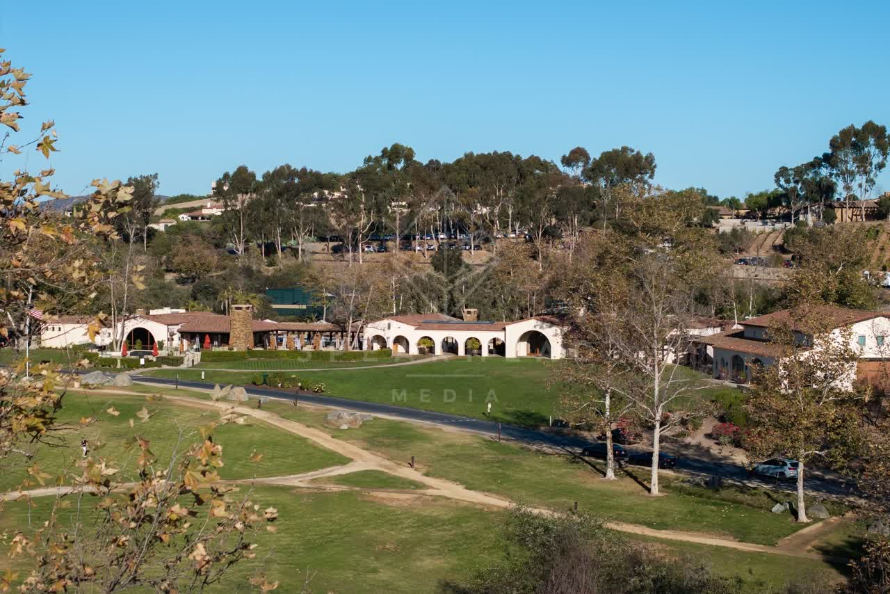 The country inland, the buildings and traffic in Santaluz.