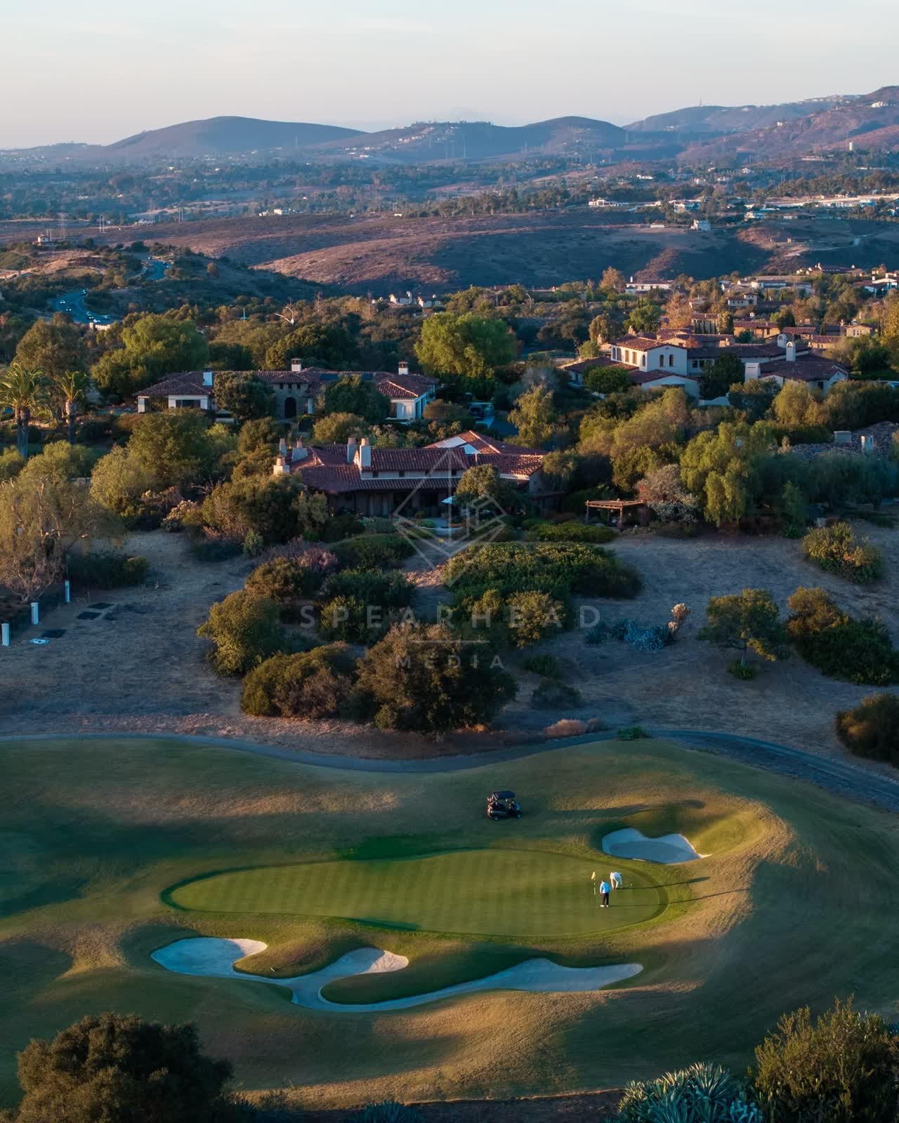 Aerial view of the country inland, homes and the buildings in Santaluz.