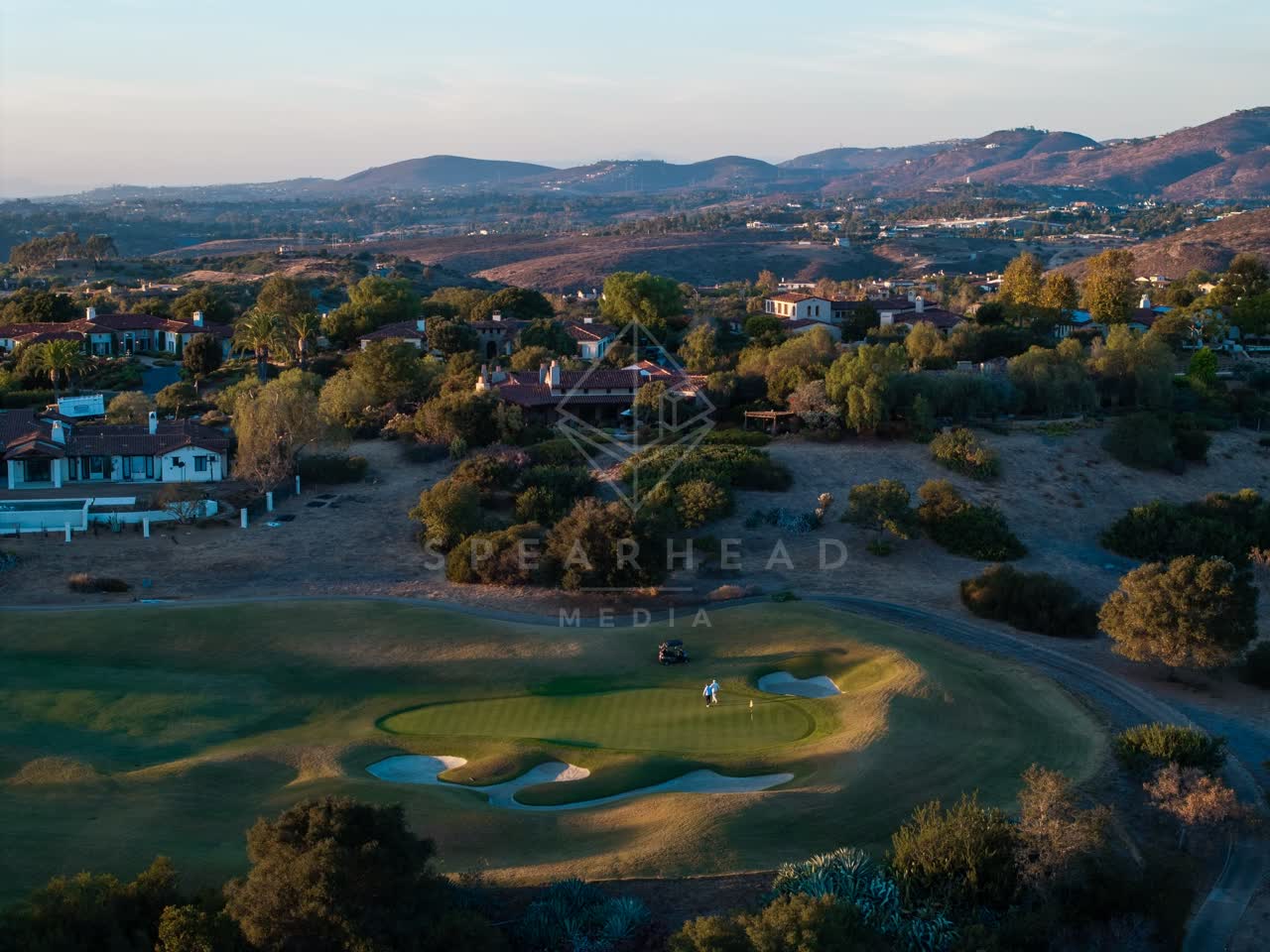 Aerial view of the country inland, homes and the buildings in Santaluz.