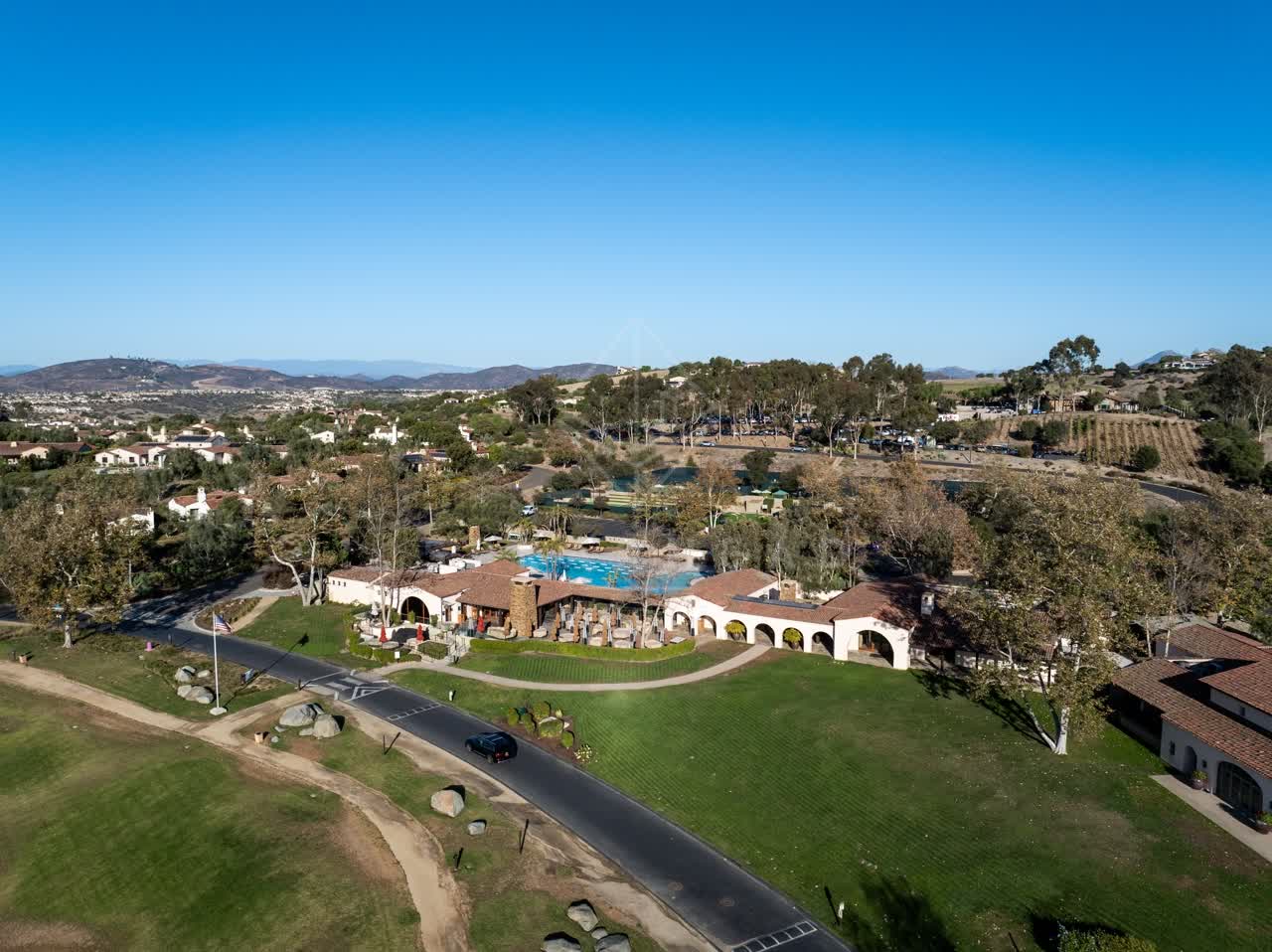 Aerial view of the country inland, homes and the buildings in Santaluz.
