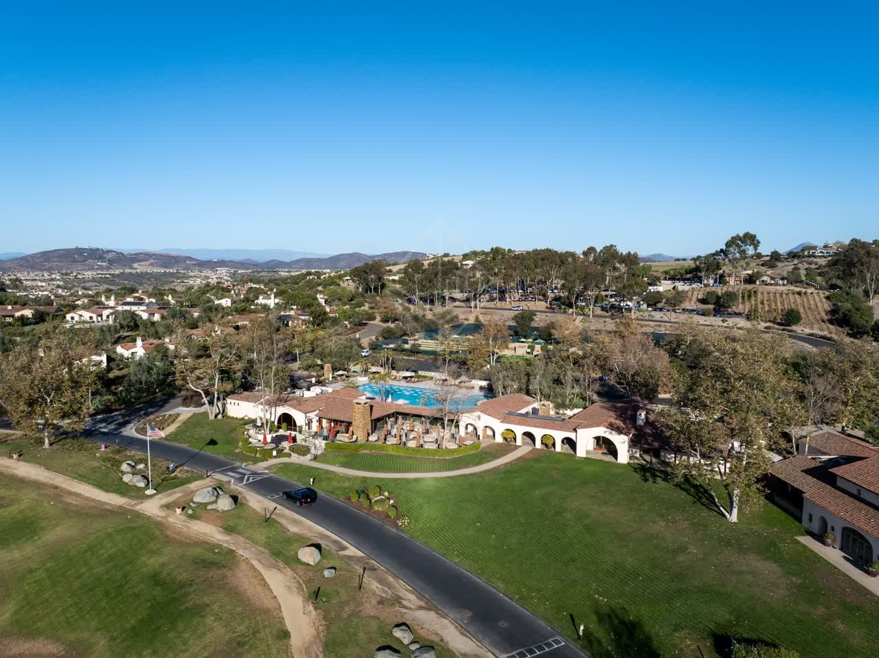 Aerial view of the country inland, homes and the buildings in Santaluz.